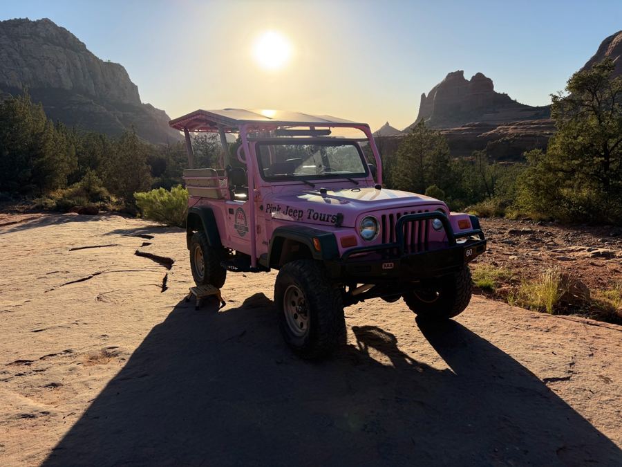 Pink Jeep on the red rocks of Sedona